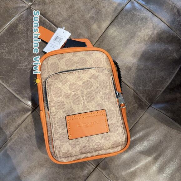 NWT Coach Racer Sling Pack In Colorblock Signature Canvas CAJ38 Spice Orange - Picture 1 of 9